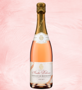 Bouteille de crémant de Bourgogne rosé André Delorme, rosé pétillant fin et élégant, parfait pour un repas de fêtes chic.